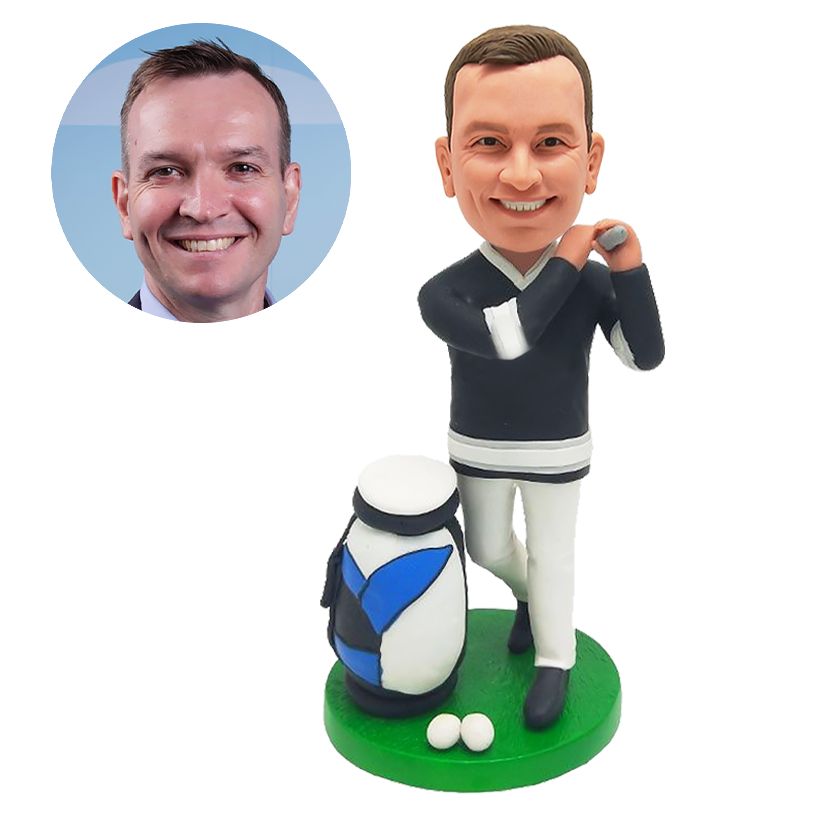 custom made bobblehead golfer with a golf bag holding a golf club