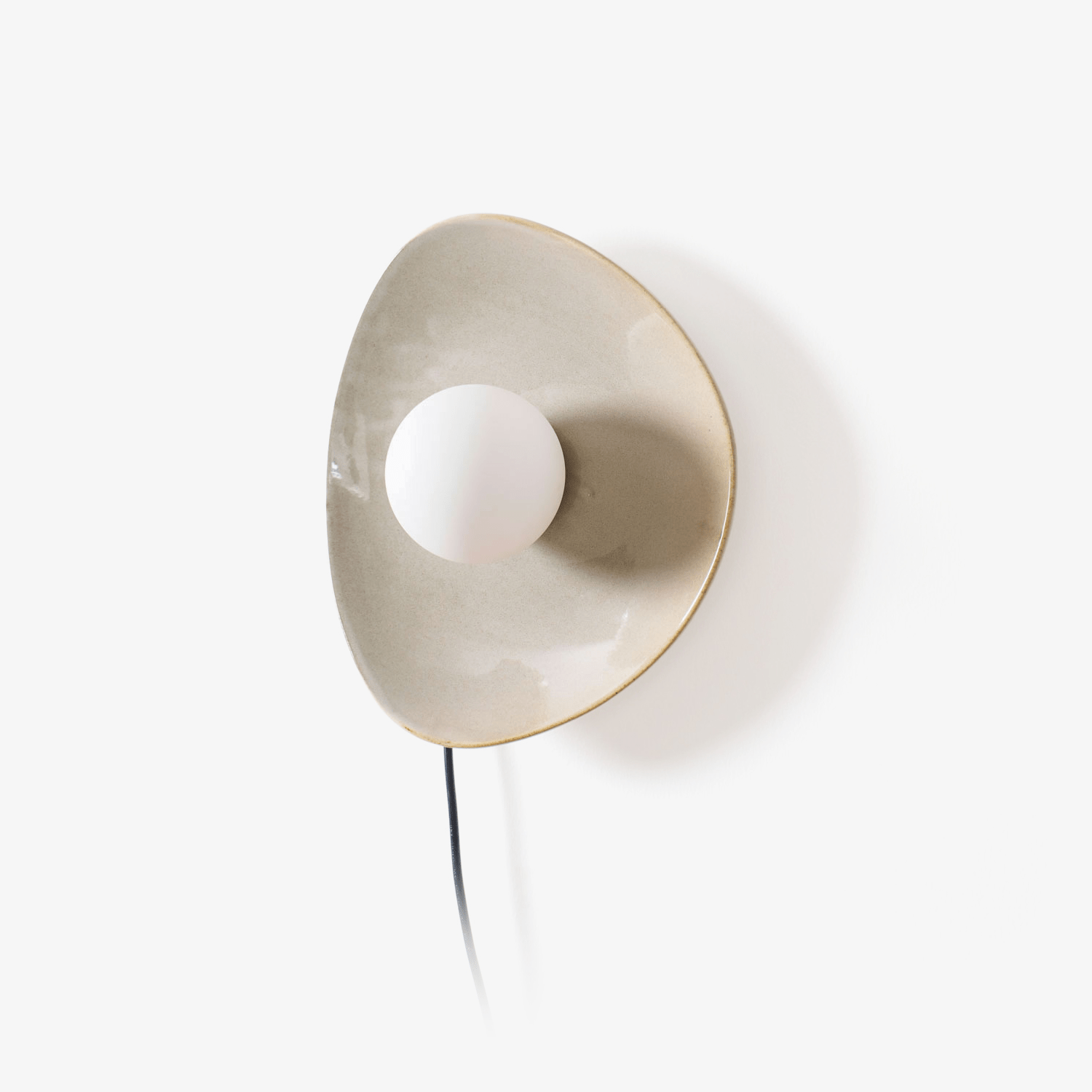 Pebble Disc Plug-in Aplique