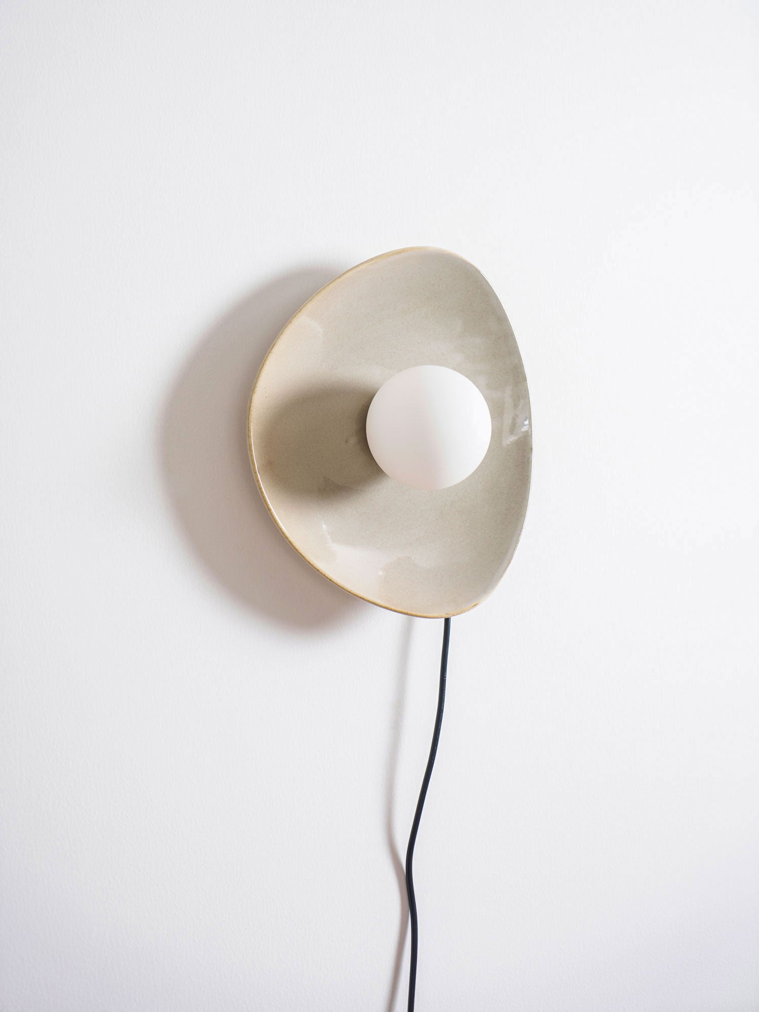 Pebble Disc Plug-in Aplique