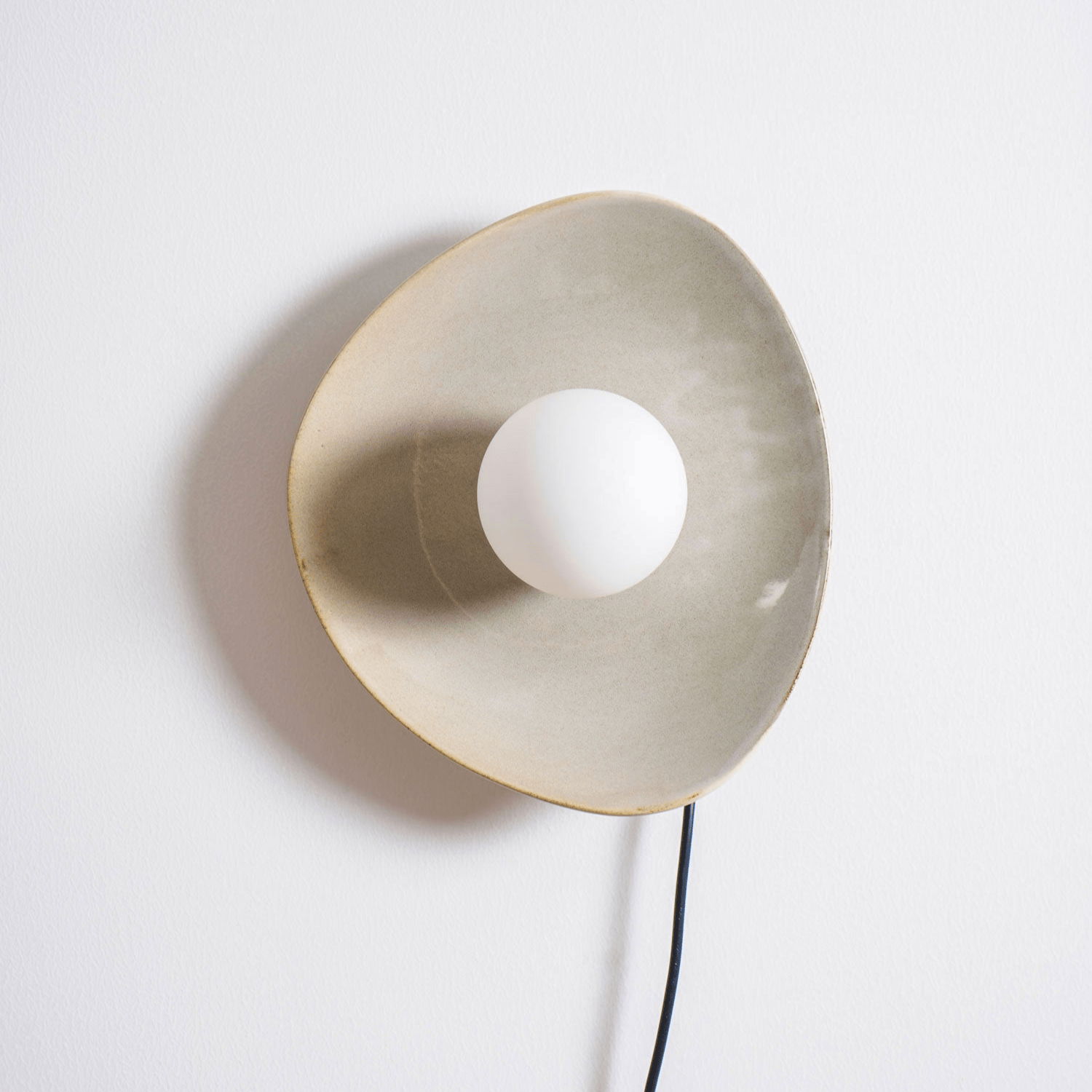 Pebble Disc Plug-in Aplique