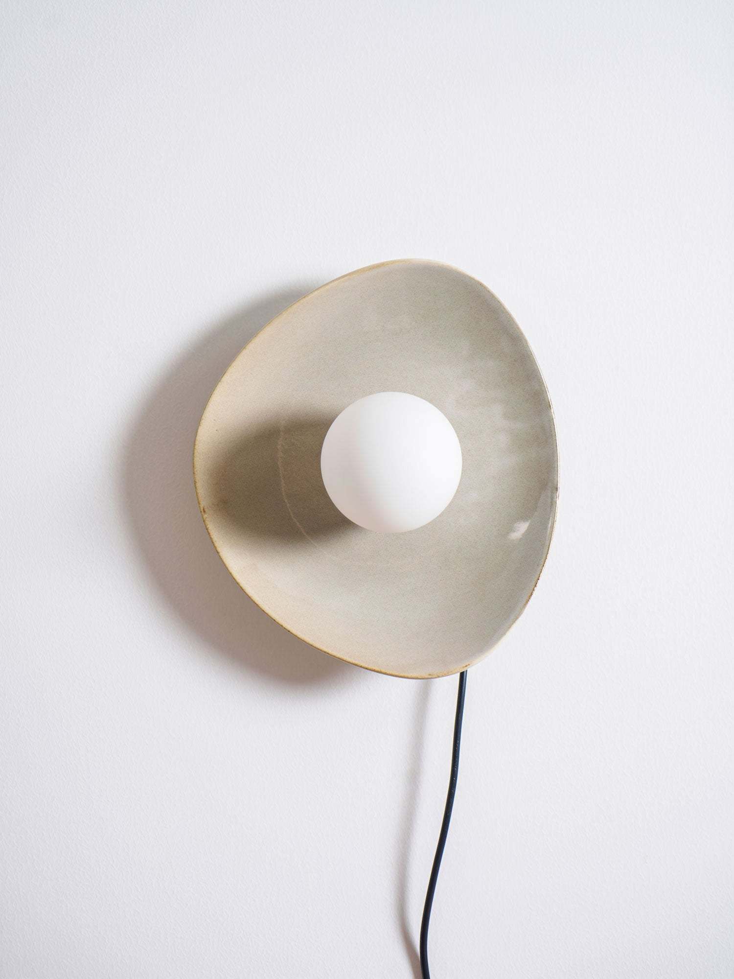 Pebble Disc Plug-in Aplique