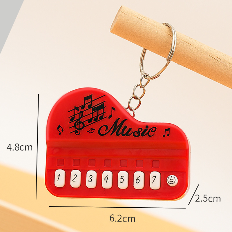 Mini Electronic Piano Keychain Creative Handheld Piano Luminous Music Bag Pendant