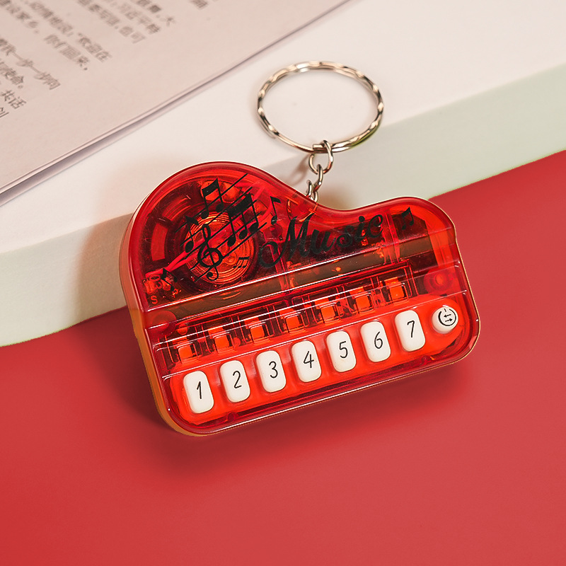 Mini Electronic Piano Keychain Creative Handheld Piano Luminous Music Bag Pendant