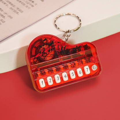 Mini Electronic Piano Keychain Creative Handheld Piano Luminous Music Bag Pendant