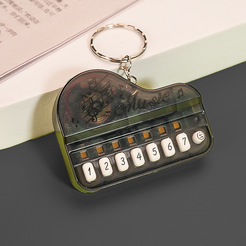 Mini Electronic Piano Keychain Creative Handheld Piano Luminous Music 