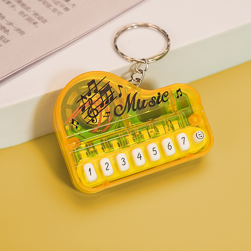 Mini Electronic Piano Keychain Creative Handheld Piano Luminous Music 