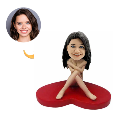 Bobblehead of a Sexy Woman Ssitting on a Red Love Heart