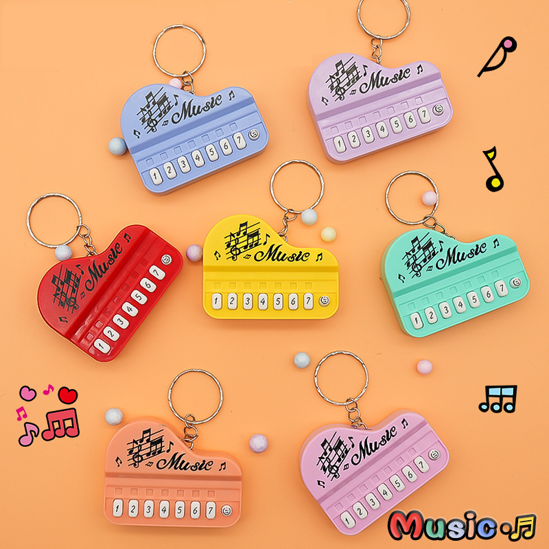 Mini Electronic Piano Keychain Creative Handheld Piano Luminous Music Bag Pendant