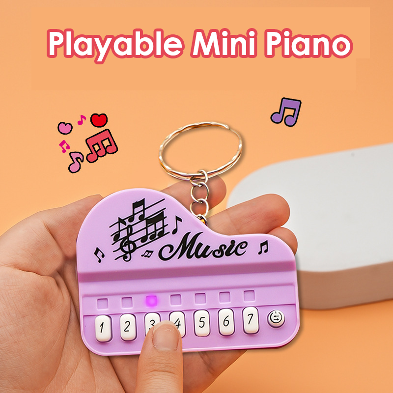 Mini Electronic Piano Keychain Creative Handheld Piano Luminous Music Bag Pendant