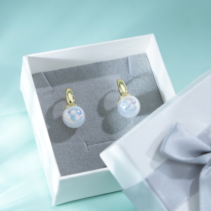 Pearl earrings with ring
