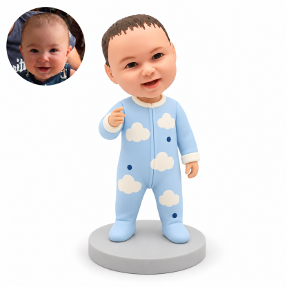 custom bobblehead figure baby standing in a footed onesie with one hand raised in front