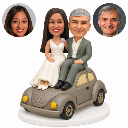 custom bobblehead figures wedding couple seated on the roof of a fixed rounded classic car