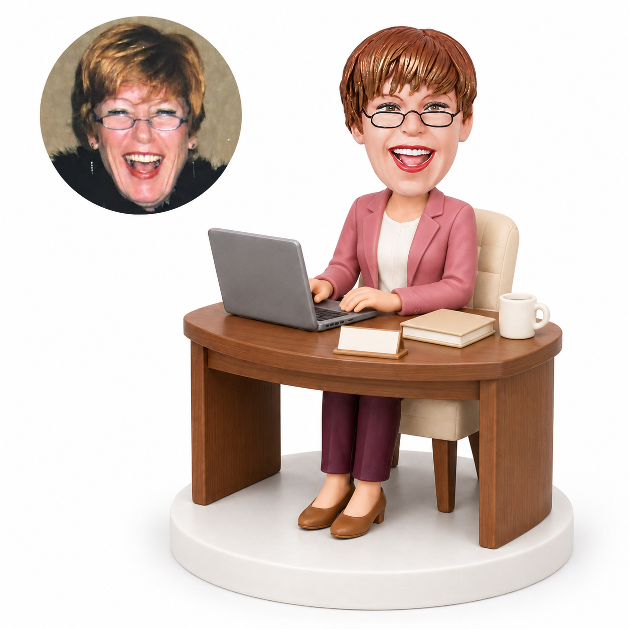 custom bobblehead figure businesswoman at a curved desk with a laptop