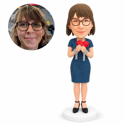 custom bobblehead figure woman in a short sleeve dress holding a heart with wrist chains