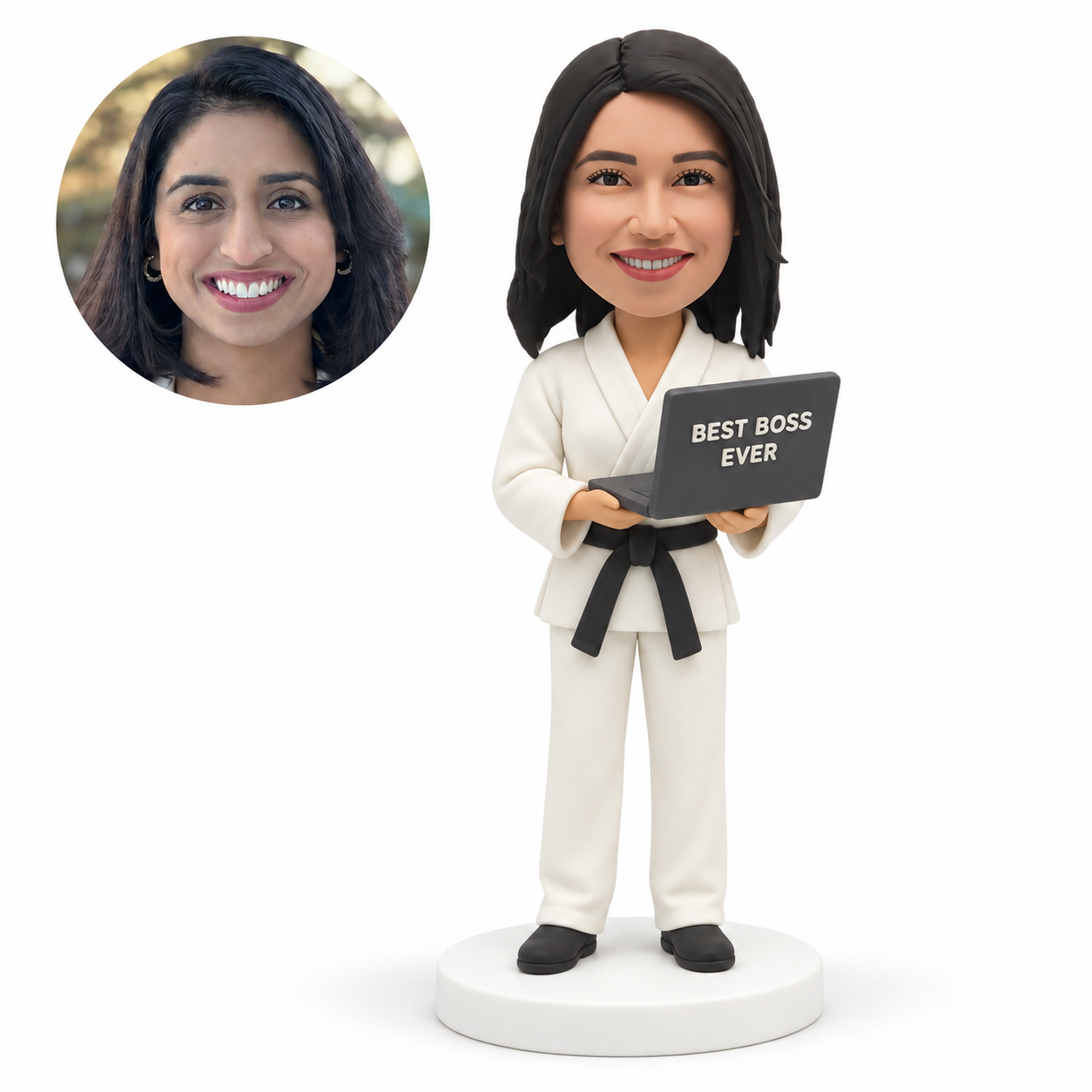 custom bobblehead figure woman in a martial arts uniform supporting an open laptop with both hands