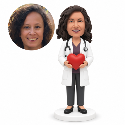 custom bobblehead figure female doctor holding a large heart with both hands