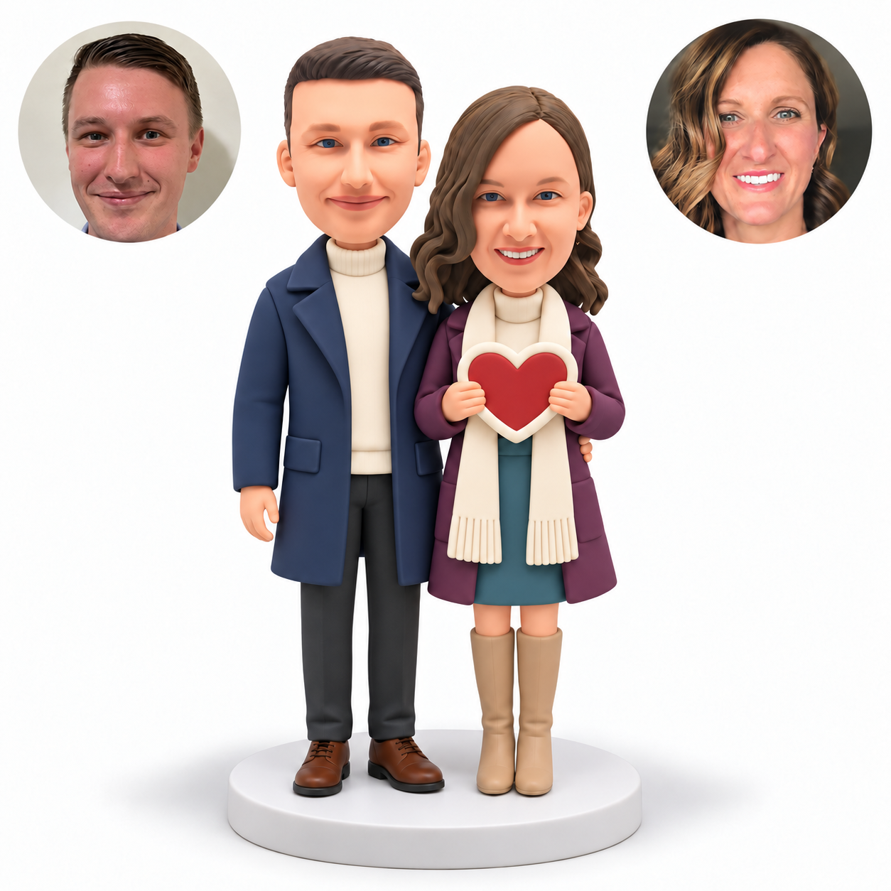 custom bobblehead figures couple in long coats with woman wearing a scarf and holding one heart plaque