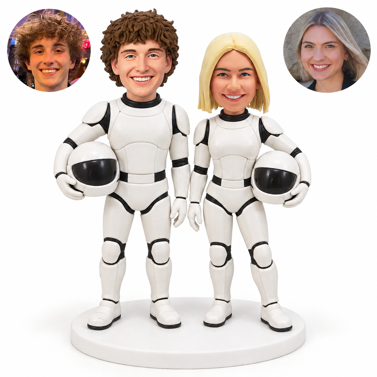 custom bobblehead figures space armor couple each holding a plain white helmet