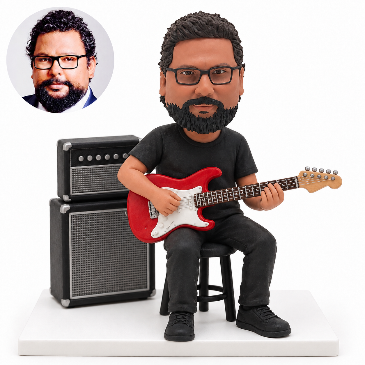 custom bobblehead figure seated male electric guitarist beside stacked amplifiers
