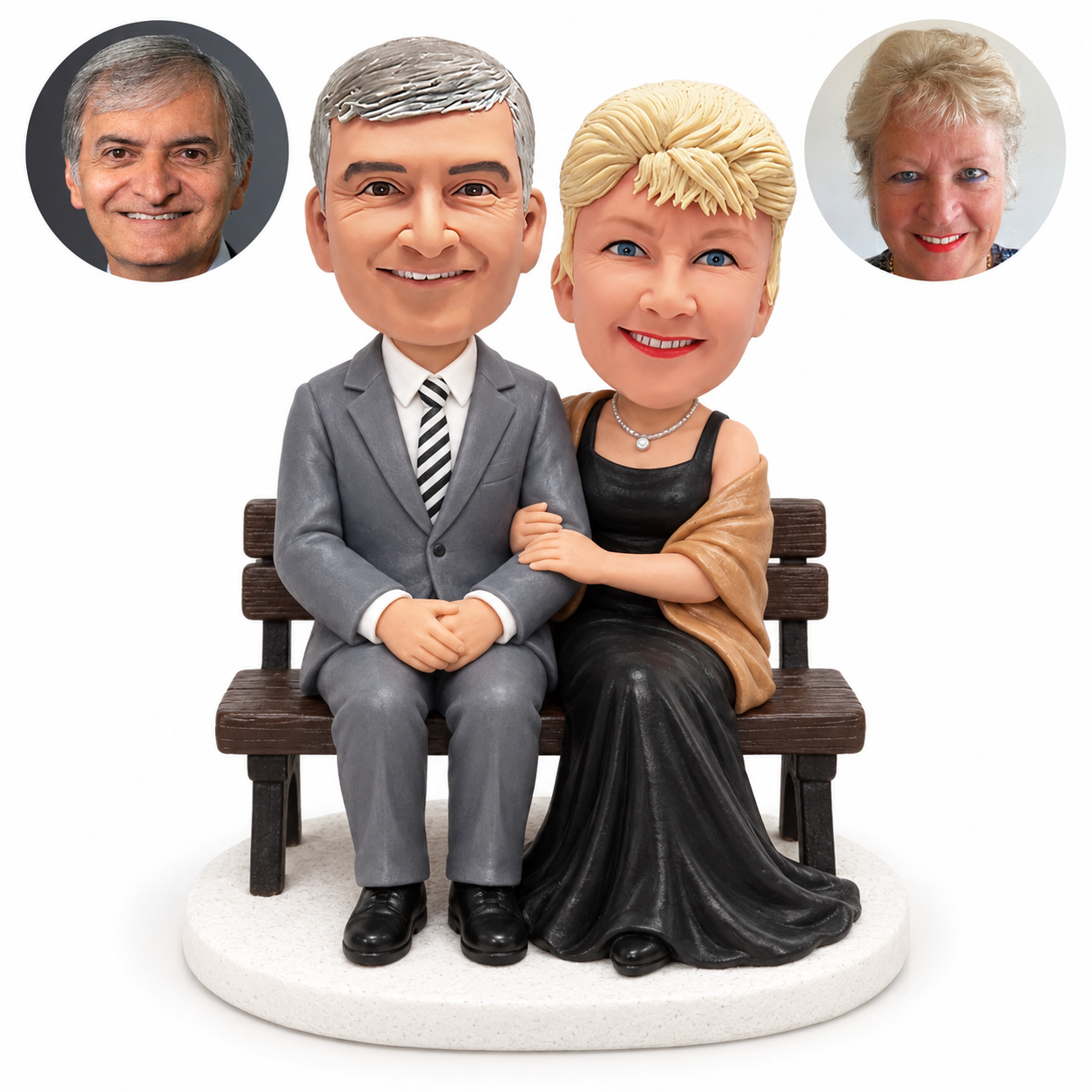 custom bobblehead figures formal couple seated closely on a wooden bench
