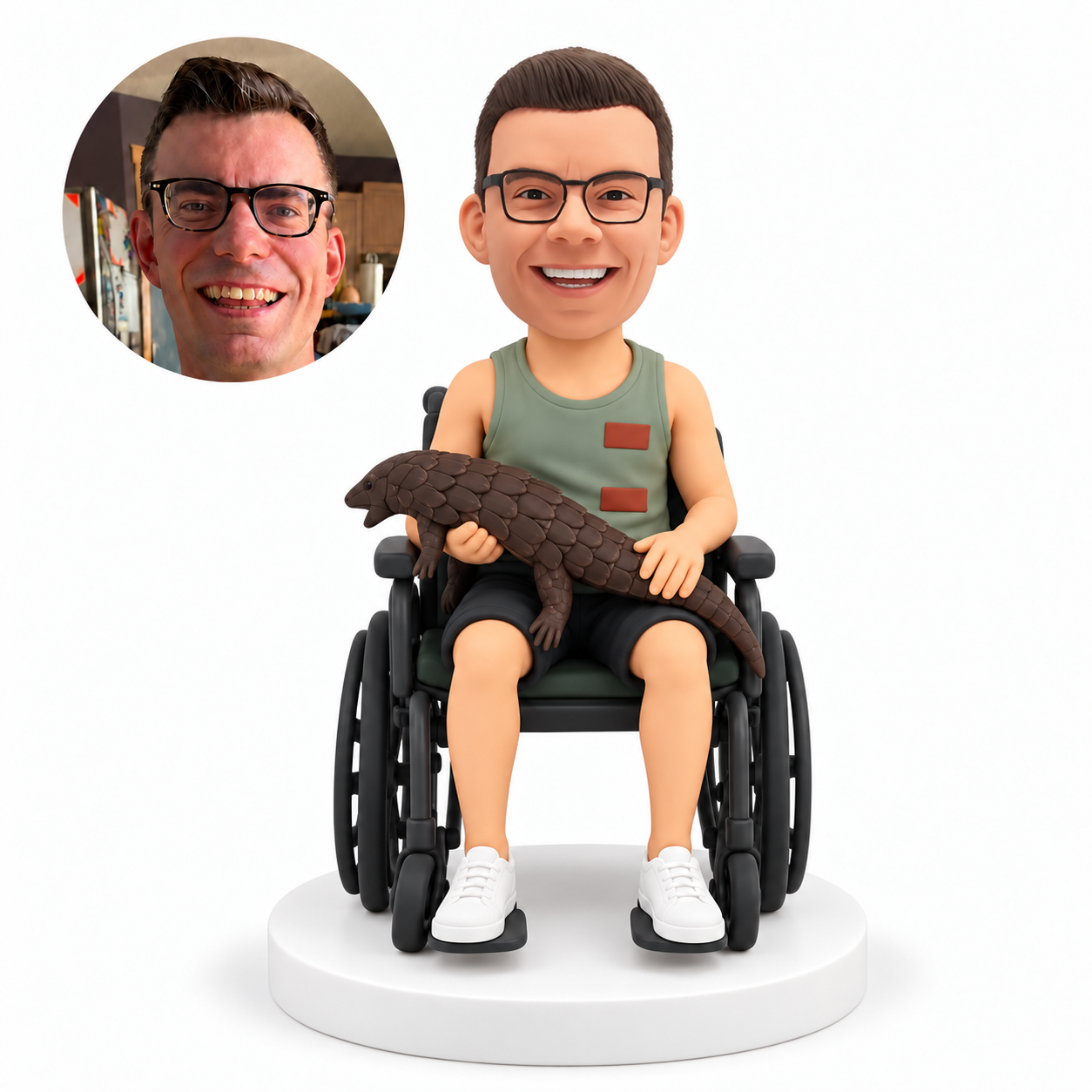 custom bobblehead figure man in a wheelchair holding a scaled animal across his lap