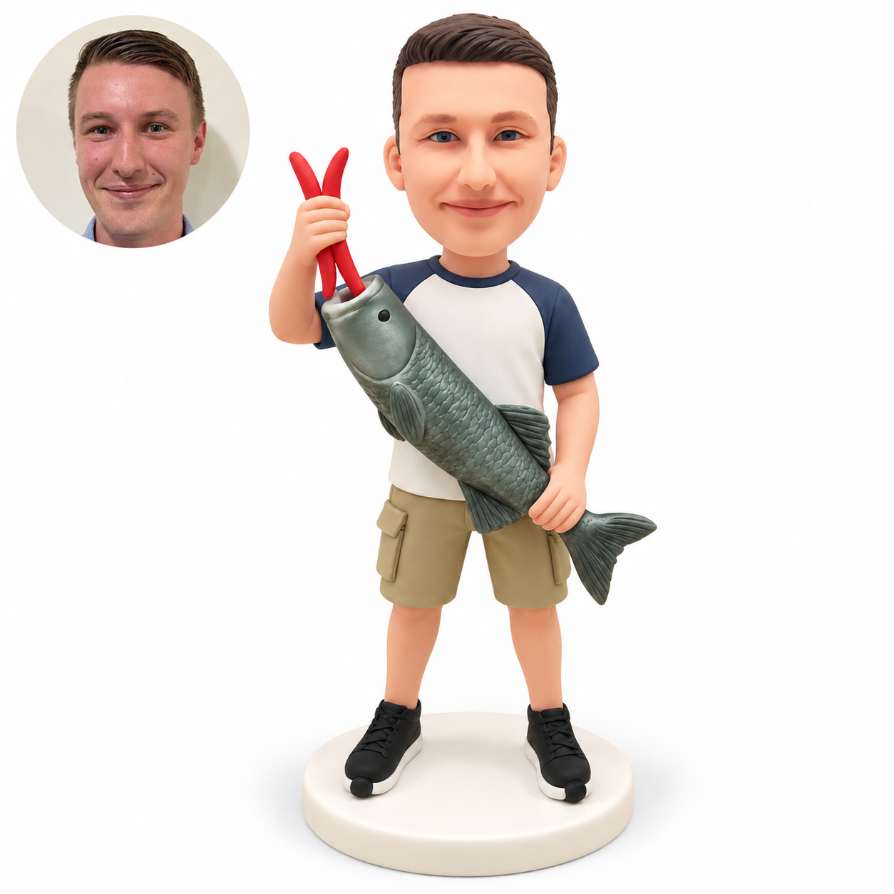 custom bobblehead figure man holding a giant fish diagonally with a raised red gripper