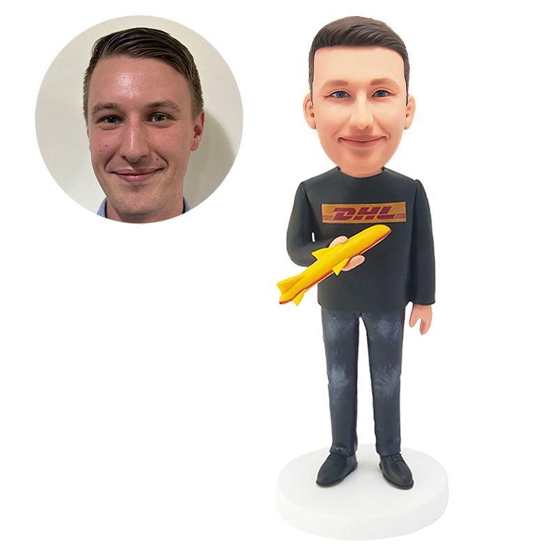 custom bobblehead figure courier holding a plane model