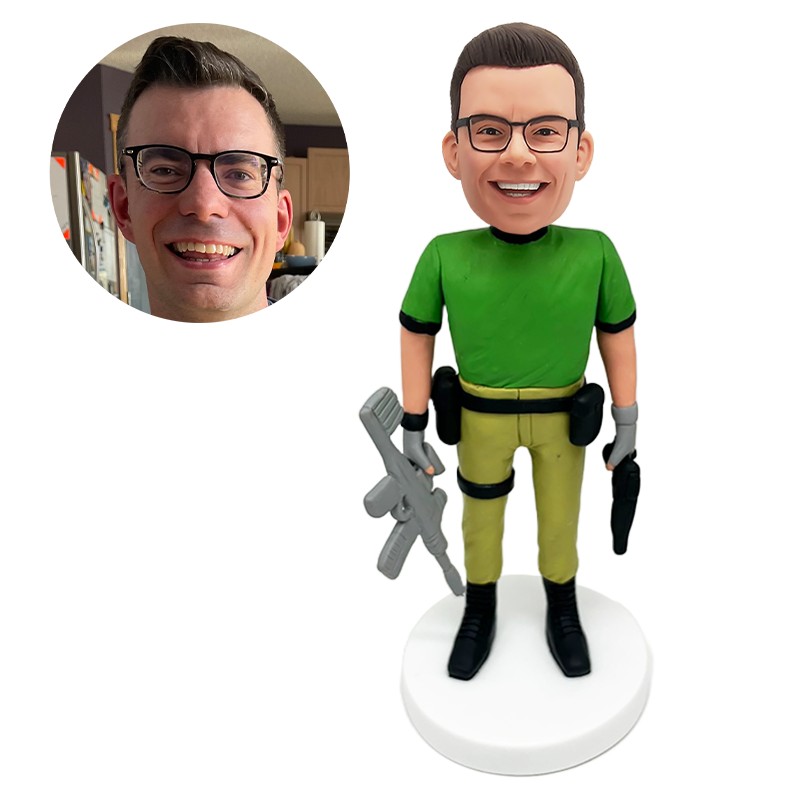 custom bobblehead figure man holding a gun