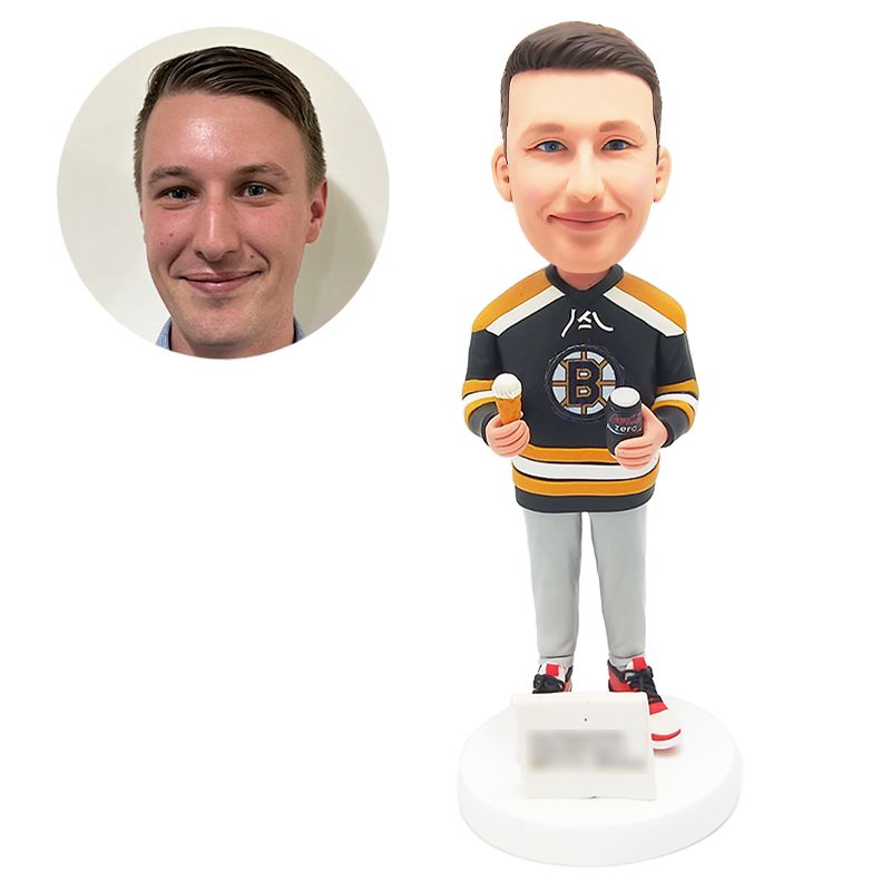 bobble head figurine man holding drinks