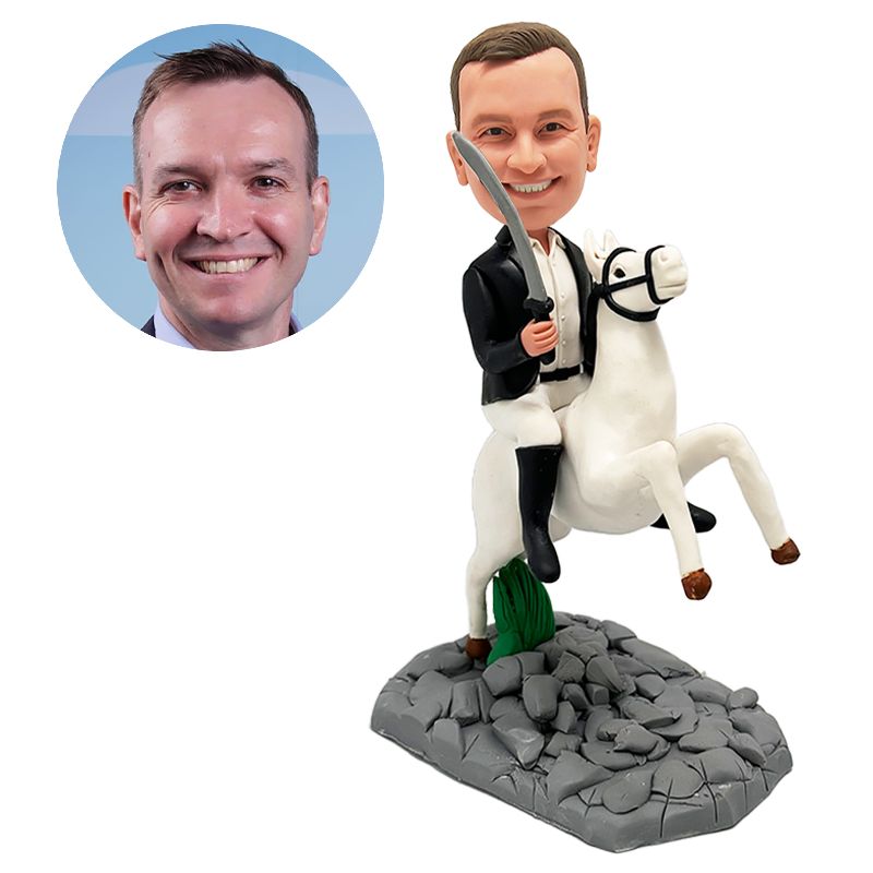 bobble head figurine man riding on a horse