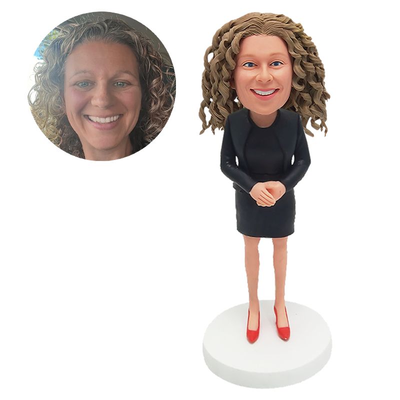 bobble head figurine office lady with hands folded