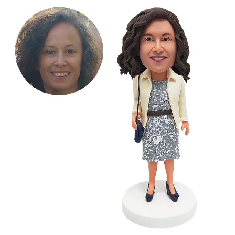 custom bobblehead figure lady holding a bag