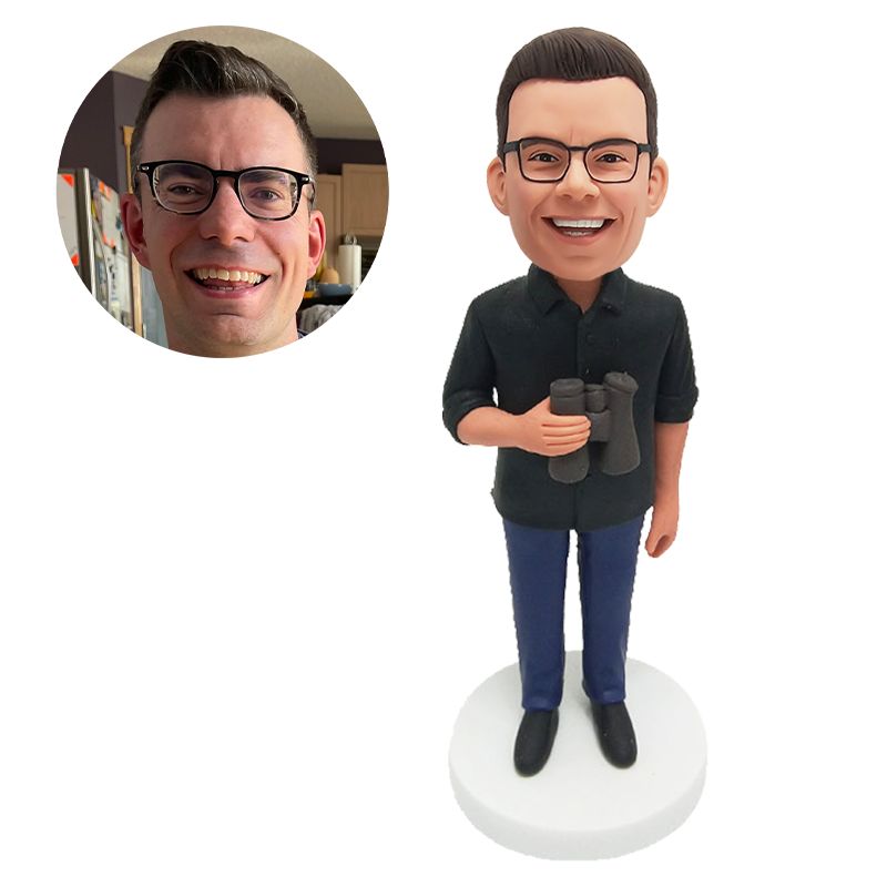 custom bobblehead figurine man holding a telescope