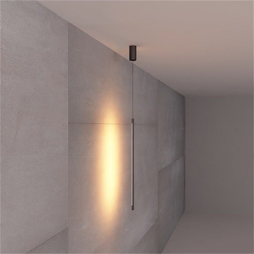 Minimalist LED Pendant Lights Beside Lamp Bedroom Scene