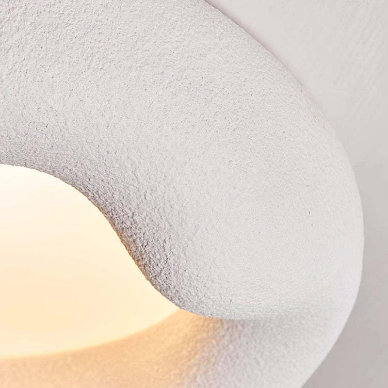 Quinn Ceiling Light: Close-up of textured surface, soft glow