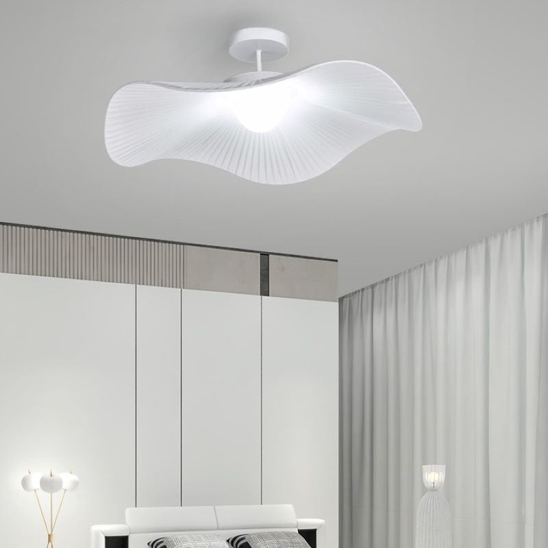 White modern flush mount ceiling light in bedroom