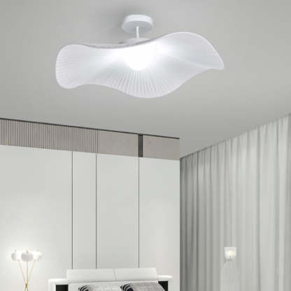 White modern flush mount ceiling light in bedroom