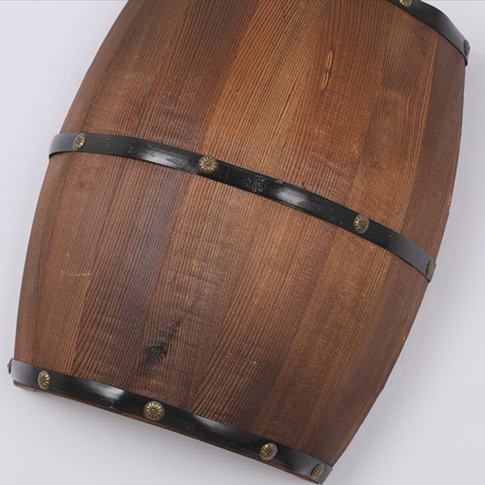 Rustic wooden barrel wall lamp for dining room lighting.