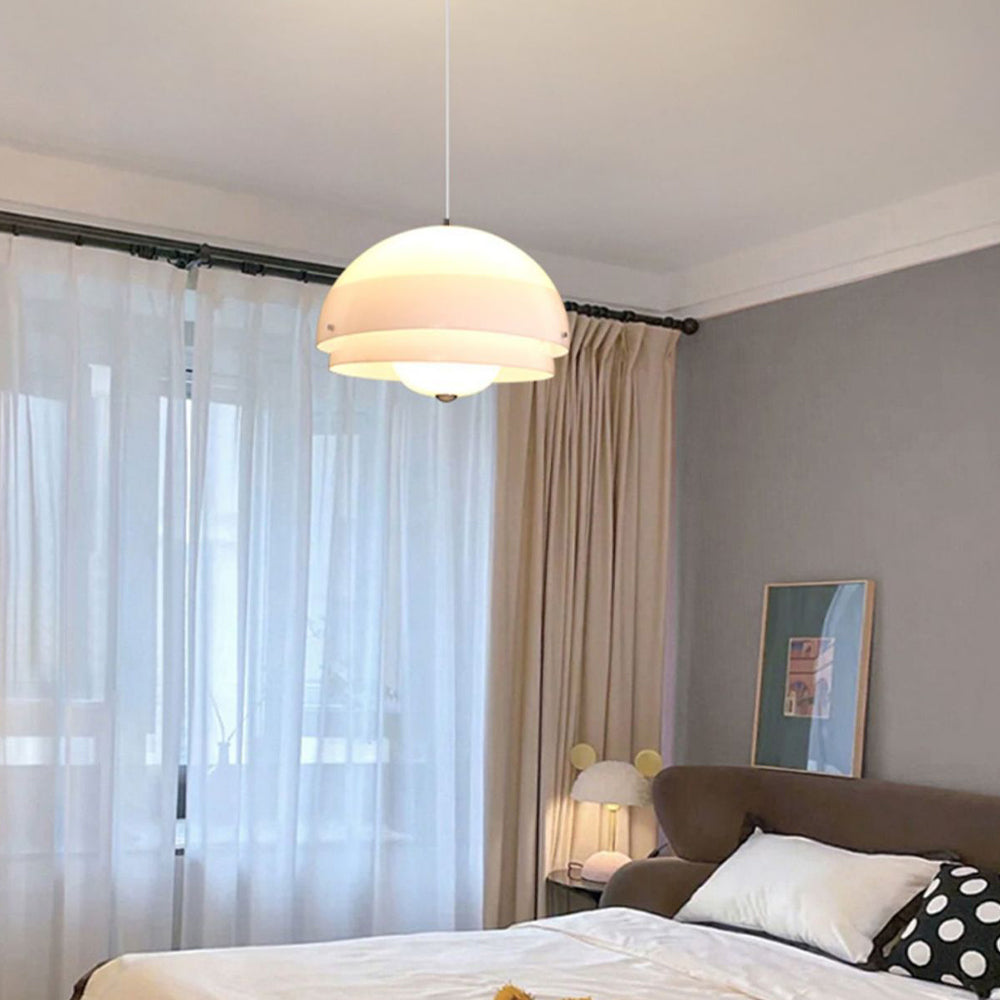 Bauhaus Nordic pendant light illuminating bedroom, modern interior.