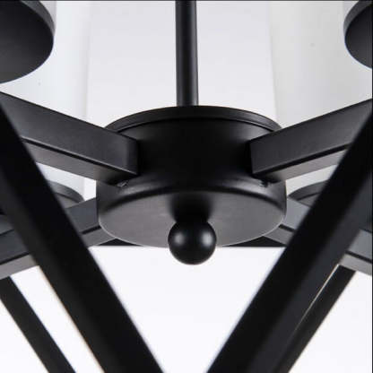 Close-up of Alessio black metal pendant light fixture.