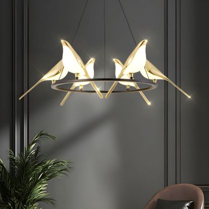 Alice bird pendant light fixture with gold finish.