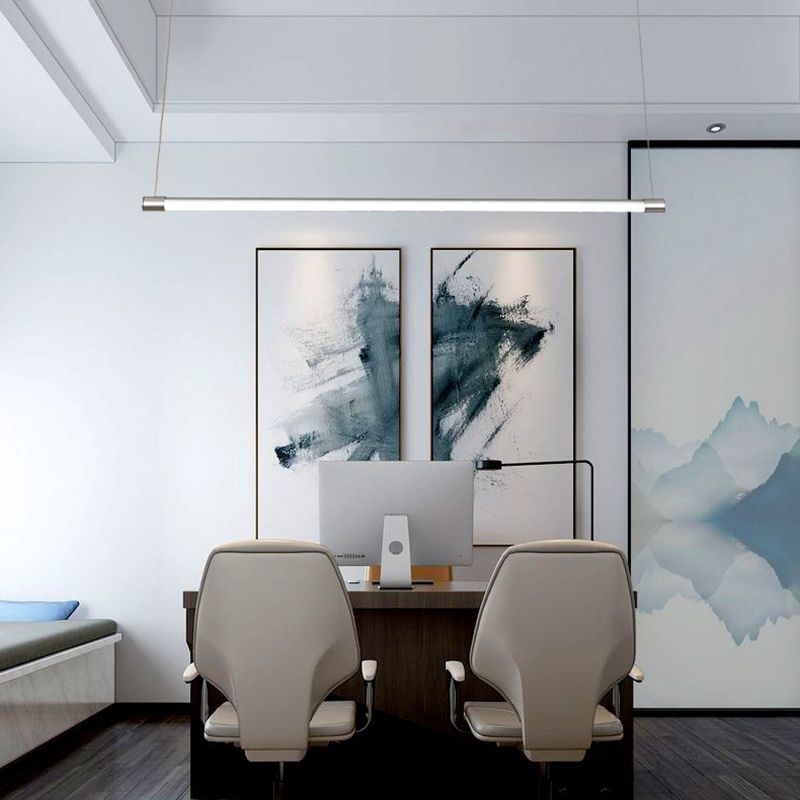 Modern office with linear pendant lighting.