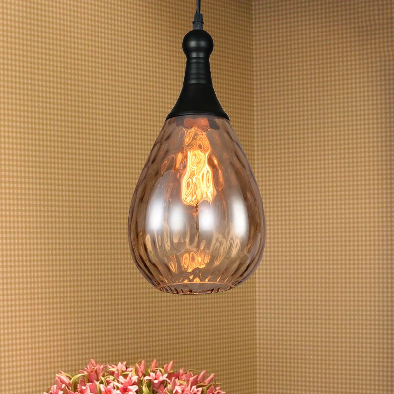 Brass Amber teardrop pendant light. Las Sola home lighting.