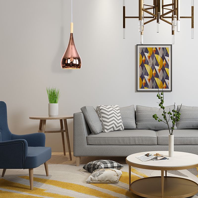 Rose gold Avi pendant light in modern living room