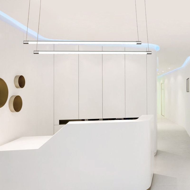 Silver Edge LED Pendant Light over white reception desk