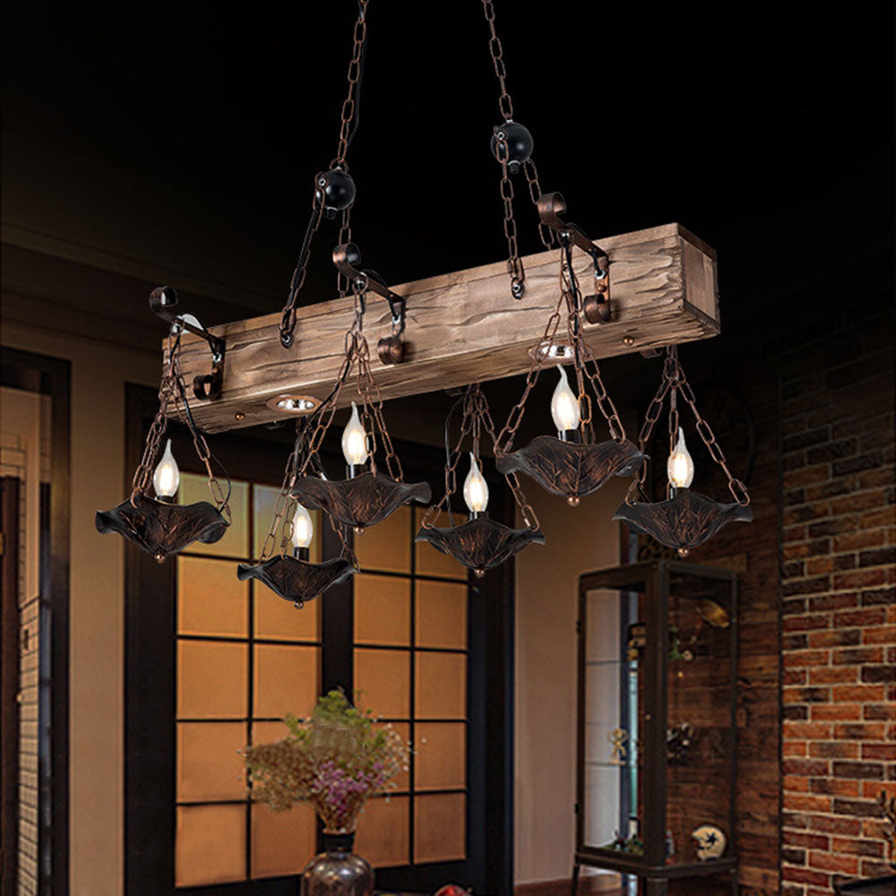 Bronze Austin pendant light with wood beam.
