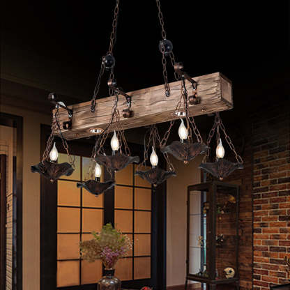 Bronze Austin pendant light with wood beam.