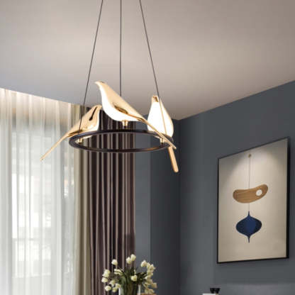 Art Deco bird pendant light in a modern living room.