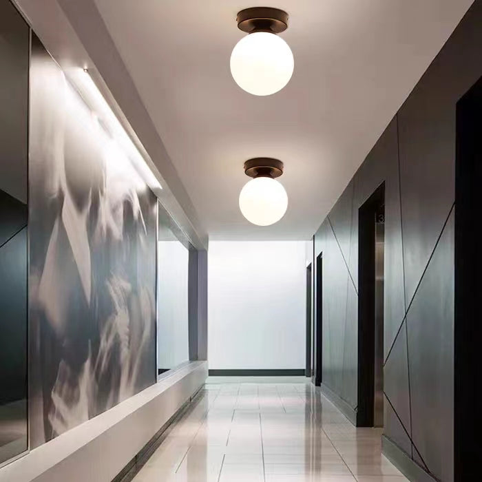 Modern hallway with Valentina globe ceiling lights