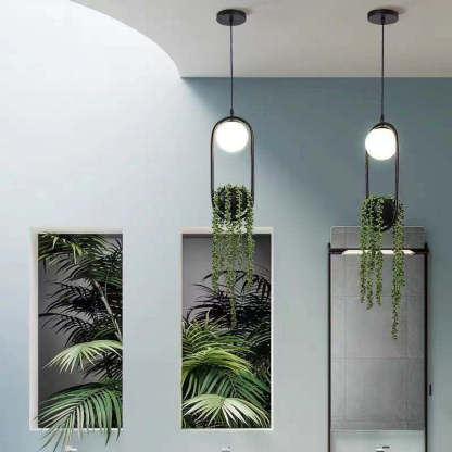 Metal pendant light with plant, Las Sola artistic lighting